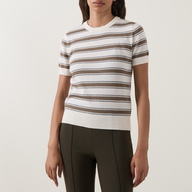 Model wearing Vince T-Shirt in Artichoke Combo, short-sleeve striped knit with crew neck, styled with dark trousers.