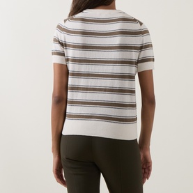 Model wearing Vince T-Shirt in Artichoke Combo, short-sleeve striped cotton-cashmere knit, back view, styled with dark green trousers.
