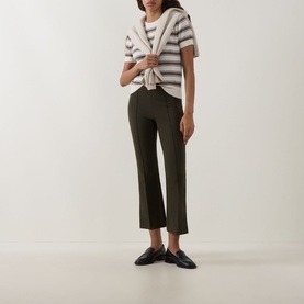 Model wearing Vince Artichoke Combo striped cotton-cashmere T-shirt, styled with olive cropped trousers and black loafers.