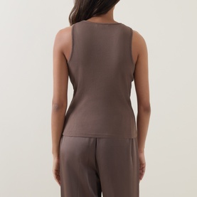 Model wearing Vince brown cashmere-silk sleeveless top, back view, styled with matching brown wide-leg trousers.