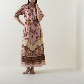Model wearing Zimmermann Mauve Jacobean floral print midi dress with puff sleeves and cinched waist, styled with tan heeled sandals