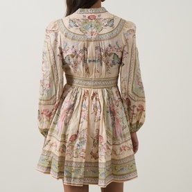Model wearing Zimmermann Dress in Sage Tapestry Floral, back view, linen with floral print, balloon sleeves and full skirt