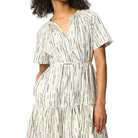 Model wearing Whistles cream wrap-style tiered midi dress with abstract brushstroke print, flutter sleeves, and self-tie belt
