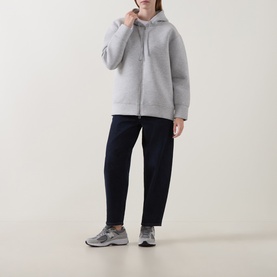Model wearing InWear Asvin Zip Hoodie in New Light Grey M with drawstring hood, styled with navy trousers and grey trainers.