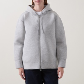 Model wearing InWear Asvin Zip Hoodie in New Light Grey M, melange fabric, zip-up front, drawstring hood, dropped shoulders