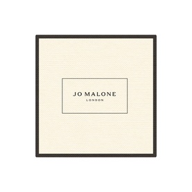 Jo Malone London Green Tomato Vine Candle in cream gift box with dark border and brand logo