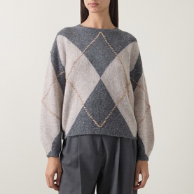 Model wearing Luisa Cerano argyle knit sweater in grey and cream multi with metallic detail stitching, styled with grey trousers