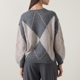 Model wearing Luisa Cerano argyle knit jumper in grey and beige multi, shown from behind with balloon sleeves and contrast stitch detail.