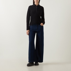 Model wearing Luisa Cerano truffle wool-cashmere polo knit with wide-leg dark indigo jeans and black chunky loafers.