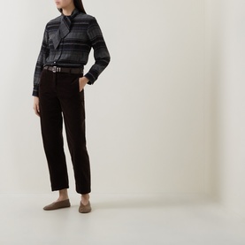 Model wearing Luisa Cerano Velvet Barrel Leg Cropped Trousers in Truffle, styled with a dark striped shirt and brown belt