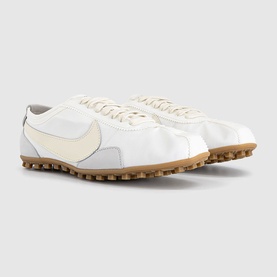 Nike Moon Shoe Trainers in Summit White Soft Pearl, nylon upper with leather Swoosh detail and signature gum Waffle outsole, angled pair view