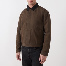 Model wearing Paige Pinecone casual jacket in cotton with black collar, styled with black jeans