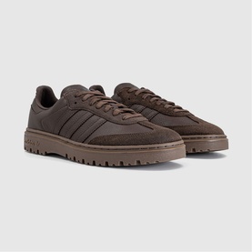 Adidas dark brown suede and nubuck low-top trainers with three stripe detail and chunky brown lug sole, pair angled view