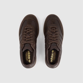 Adidas dark brown leather lace-up trainers with tonal brown sole, seen from above showing both shoes side by side