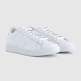 Nike low-top trainers in white leather with tonal Swoosh logo, white laces and speckled white rubber sole