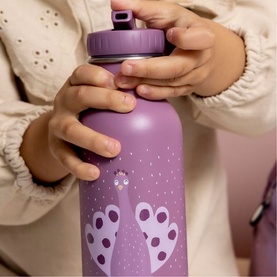 Trixie purple children's water bottle with hedgehog design and purple flip-top lid, held by a child