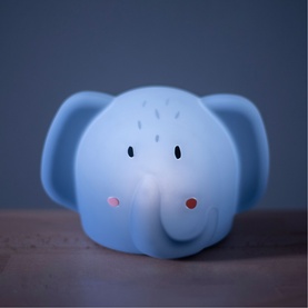 Trixie blue elephant night light glowing softly, children's bedside lamp with cute face detail