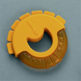 Trixie orange circular silicone teething toy with textured ridges and raised bead details, ring-shaped with decorative cutout