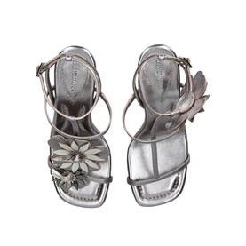 Silver strappy flat sandals with floral embellishment and jewel detailing, ankle buckle strap, square toe, overhead flat lay view