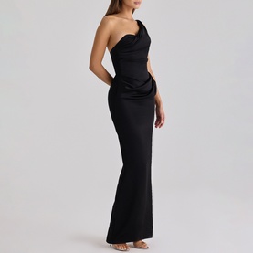 Model wearing black one-shoulder maxi dress with ruched bodice, cut-out waist detail, and fitted fishtail skirt