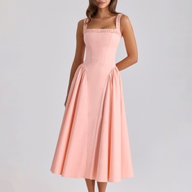Model wearing House of CB peach midi dress with square neckline, ruched straps, fitted bodice and full A-line skirt