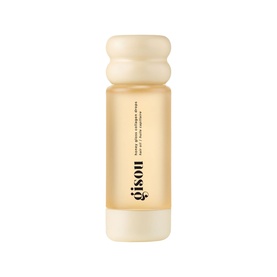 Gisou Hair Oil in a cream and amber glass bottle with ribbed cap, travel-friendly size