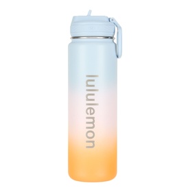 Lululemon water bottle in Starch Blue to Citrus Sizzle ombre gradient, flip-top lid with carry handle, branded logo detail