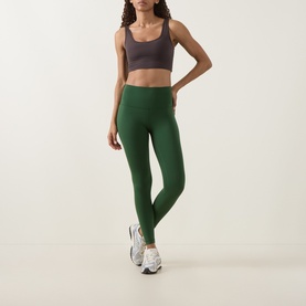 Model wearing Lululemon Ivy Grove leggings with a grey sports bra and white trainers, full-length front view.