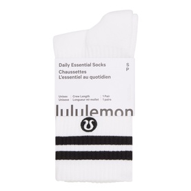Lululemon Daily Essential Socks in white with black stripe detailing, crew length, unisex, 1 pair packaging shown