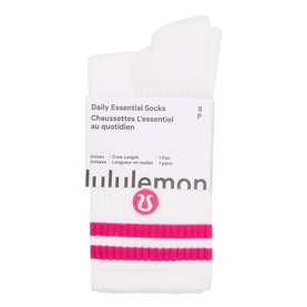 Lululemon Daily Essential Socks in White/Pink Flare, crew-length style with two pink stripes, packaged as a single pair.