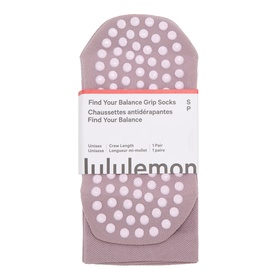 Lululemon Find Your Balance Grip Socks in Lotus Lavender, crew length, unisex, with white grip dots, shown in packaging