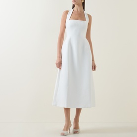Model wearing Odd Muse Cinched Halter Dress in white, featuring structured bodice, cinched waist and midi-length skirt, styled with silver heels.
