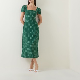 Model wearing Odd Muse Polka Dot Slip Dress in green polka dot, midi length, square neckline, short sleeves, styled with white mule heels