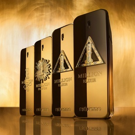 Paco Rabanne 1 Million Night Elixir Parfum Elixir collection, four gold rectangular bottles displayed on reflective surface with warm golden