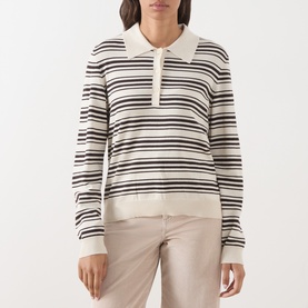 Model wearing Part Two Mole Stripe knit polo top with long sleeves and zip collar, styled with beige trousers.