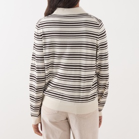 Model wearing Part Two Mole Stripe knitwear, rear view showing horizontal stripe pattern with collared neckline, styled with cream trousers.
