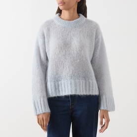 Model wearing Part Two Gray Dawn mohair blend crew neck jumper with fluffy texture, styled with dark blue jeans