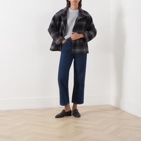 Model wearing Part Two Gray Dawn mohair-wool knitwear, styled with dark plaid jacket, navy cropped jeans and black loafers.