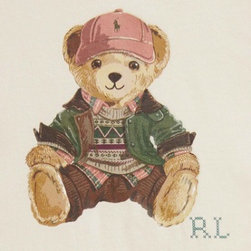 Ralph Lauren Polo Bear graphic detail from the Estate Cream Baby Two-Piece Set, showing bear in green jacket, fair isle jumper and pink cap.