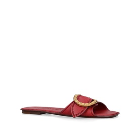 Zimmermann red leather flat slide sandal with gold circular buckle embellishment and open toe, flat sole.
