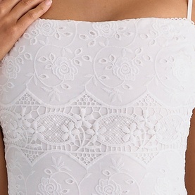 House of CB white lace bandeau top, close-up detail showing floral and geometric crochet lace pattern