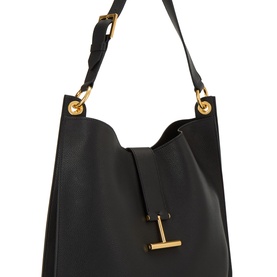 Tom Ford Tara Large Crossbody Bag in black calfskin with gold-tone hardware, signature T-bar pendant, and adjustable shoulder strap