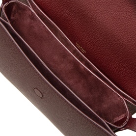 Tom Ford Kara Small Crossbody Bag in Lost Cherry, interior view showing suede lining, slip pocket, and foil brand lettering