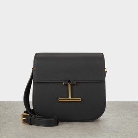 Tom Ford Tara Mini Crossbody Bag in black grained calfskin with gold-tone T-bar detail, flap closure, and adjustable crossbody strap