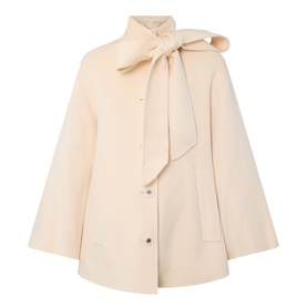 Zimmermann cream wool-blend jacket with oversized bow tie collar, wide sleeves, and snap button fastening