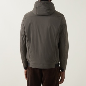 Model wearing Bugatti Dynamic Padded Jacket in olive, rear view showing hood with drawcord, zip fastening and elasticated hem