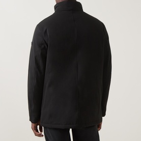 Model wearing Bugatti Rain Series Parka Jacket in black, showing rear view with stand collar and concealed zip placket.