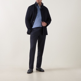 Model wearing Bugatti Short Wool Car Coat in navy, styled with light blue knitwear, navy trousers and black loafers.