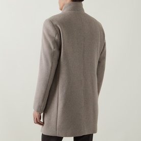 Model wearing Bugatti beige wool-blend coat, rear view showing stand collar, clean seam detail and relaxed fit