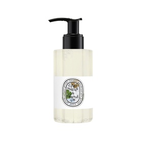 Diptyque Do Son Hand and Body Lotion in clear pump bottle with signature oval label and black pump dispenser